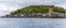 A panorama view of edge of the  town of Oban, Scotland from Oban Bay