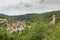 Panorama view of Eifel village Monreal and ruins of castle Philippsburg on a hill spur, Germany