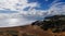 Panorama view of empty beaches and mountainous coast in Murcia under an expressive sky