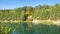 panorama view of fall colors reflecting on the surface of a lake - park, Luban, Belarus