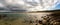Panorama view of the A Frouxeira beach in Galicia under an expressive sky