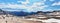 Panorama view from the glacier station below the Zugspitze with the almost melted glacier, a lot of tourists and the panorama of