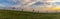 Panorama view of the historic white windmills of La Mancha above the town of Campo de Criptana at sunset