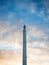 Panorama view of isolated white free standing tall tower Torre de Brantuas in Puenteceso A Coruna Galicia Spain Europe