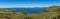 Panorama view of the Iveragh Peninsula and Kells Bay in County Kerry