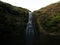 Panorama view of Karekare waterfall river lake pond green nature landscape in Waitakere Ranges West Auckland New Zealand