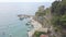 Panorama view of Monterosso al Mare village one of Cinque Terre in La Spezia, Italy. flying around the peninsula looking down