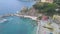 Panorama view of Monterosso al Mare village one of Cinque Terre in La Spezia, Italy. The view opens onto the peninsula, beach, sea