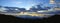 Panorama view of morning mountain landscape with wave of fog and
