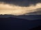 Panorama view of mountain range silhouette layers haze dust fog clouds at Misti volcano Arequipa Peru Andes