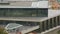 Panorama view of new Acropolis Museum, modern glass building, many tourists