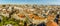 A panorama view northward across the roof tops of Porto, Portugal from the Clerigos Tower on a sunny afternoon