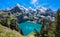 Panorama view of Oeschinensee Oeschinen lake on Bernese Oberland in Switzerland on a sunny summer day