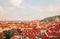 Panorama view over red roofs from Hradczany Castle in Prague.