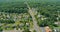 Panorama view over the small town landscape suburb homes sleeping area roof houses in Monroe New Jersey USA