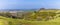 A panorama view over the surrounding countryside from the northern ramparts of the Iron Age Hill fort remains at Burrough Hill