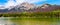 Panorama View of the Reflection of Pyramid Mountain, in the Victoria Cross Range, in Pyramid Lake in Jasper National Park