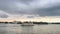 Panorama view of sailing day in the lake with another boat in front in a cloudy day trip from epcot to magic kingdom