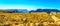 Panorama view of a Senior woman walking to the Three Rondavels viewpoint at the Blyde River Canyon