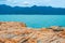 Panorama view shabby cliff cumulus cloud sky mountain island background pure blue lazure empty sea skyline. Gray brown