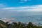 Panorama view of Shenzhen cityscape from top of Wutong Mountain on a sunny day