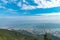 Panorama view of Shenzhen cityscape from top of Wutong Mountain on a sunny day