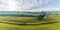 A panorama view from the southern shore across the overflow channel of Pitsford Reservoir, UK