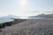 Panorama view of stone beach with view on sunny Altea coastline, Costa Blanca, Spain