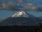 Panorama view of stratovolcano Cotopaxi white snow capped volcanic mountain seen from Latacunga Ecuador South America