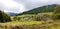 Panorama view stunning autumn landscape of Austrian village.