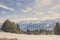 Panorama view of Swiss Alps mountai in winter with forest and blue sky
