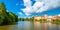 Panorama view of Telc city, Czech Republic. Historical castle above the lake. UNESCO heritage. Summer day, blue sky with clouds