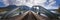 Panorama view to old metallic railway bridge with risty rails over rural river lech