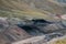 Panorama view to Tian Shan mountain and Coal Mine Kara-Keche, Naryn Province, Kyrgyzstan