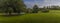 A panorama view towards the lakes in Abington Park, Northampton, UK