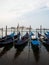 Panorama view of typical traditional gondola tourist boat ship ride in Grand Canal of Venice Venezia Veneto Italy Europe