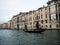 Panorama view of typical traditional gondola tourist boat ship ride in Grand Canal of Venice Venezia Veneto Italy Europe