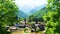 Panorama of The village in the green Shanghai mountainâ€™s in a beautiful summer day, China. Illustration.
