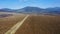 Panorama of vineyard plantation under hill - drone shot