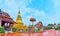 Panorama of Wat Phra That Hariphunchai Temple with Chedi and chatra umbrella, Lamphun, Thailand