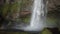 Panorama of waterfall, rainbow in the spray of water. Beautiful nature of Iceland