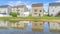 Panorama Whispy white clouds Utah valley community with reflective lake waterfront