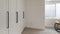 Panorama White cabinet doors in a room with carpeted flooring