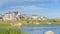 Panorama White puffy clouds Panoramic view of blue waters of Oquirrh Lake at Daybreak in South Jordan, California