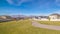 Panorama Winding footpath through a residential estate near sunset