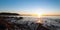 Panorama of winter sunrise at the ocean beach