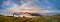 Panorama. Wonderful summer morning in the mountains. Sunrise over the mountains shrouded in fog. Carpathian mountains, Ukraine,