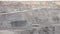 panorama of a working coal open pit (rigs and trucks)