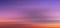 Panoramic abstract sky landscape of bright red orange sunrise sunset with motion blur