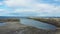 Panoramic aerial drone shot panning frome right to left near the water at Anse aux Foins, Town of Grosses Roches in Gaspesie
